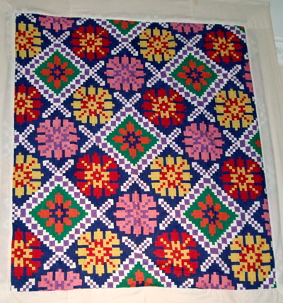 Very colorful quilt.